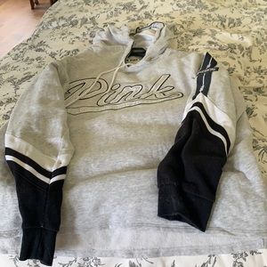 Woman’s pink sweatshirt